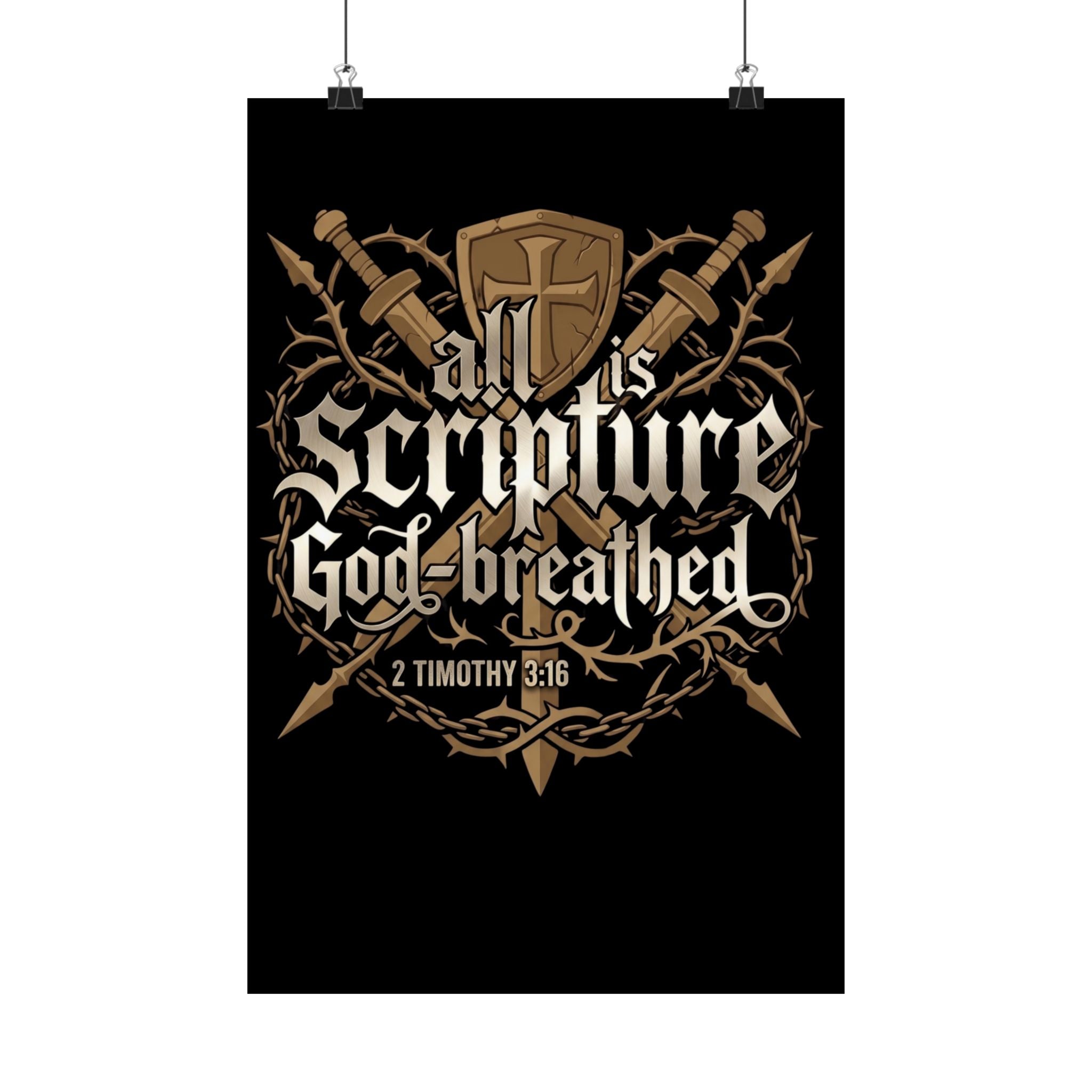 Black matte poster with crossed swords, shield of faith, crown of thorns, and bold gothic lettering reading "All Scripture is God-Breathed — 2 Timothy 3:16" hanging on clips against a white background.