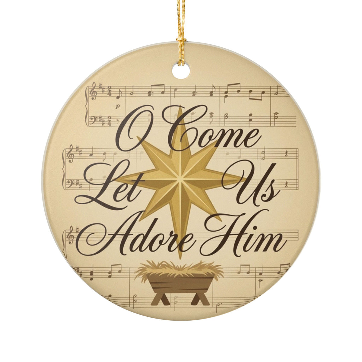 Round cream ceramic Christmas ornament with gold eight-pointed star, nativity manger, sheet music background, and elegant script reading O Come Let Us Adore Him with gold hanging string

