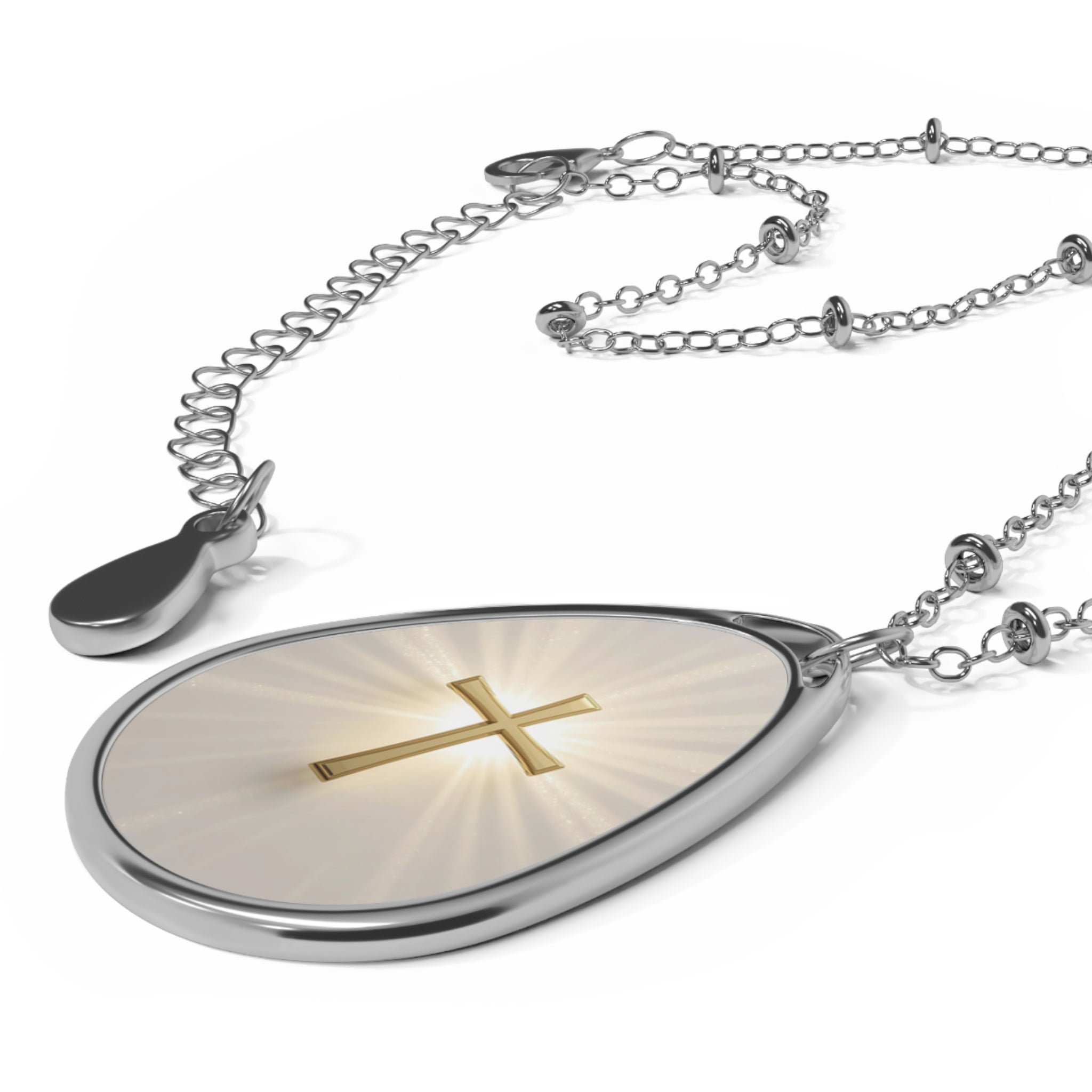 Radiant Cross Teardrop Pendant – A Wearable Reminder of Hope