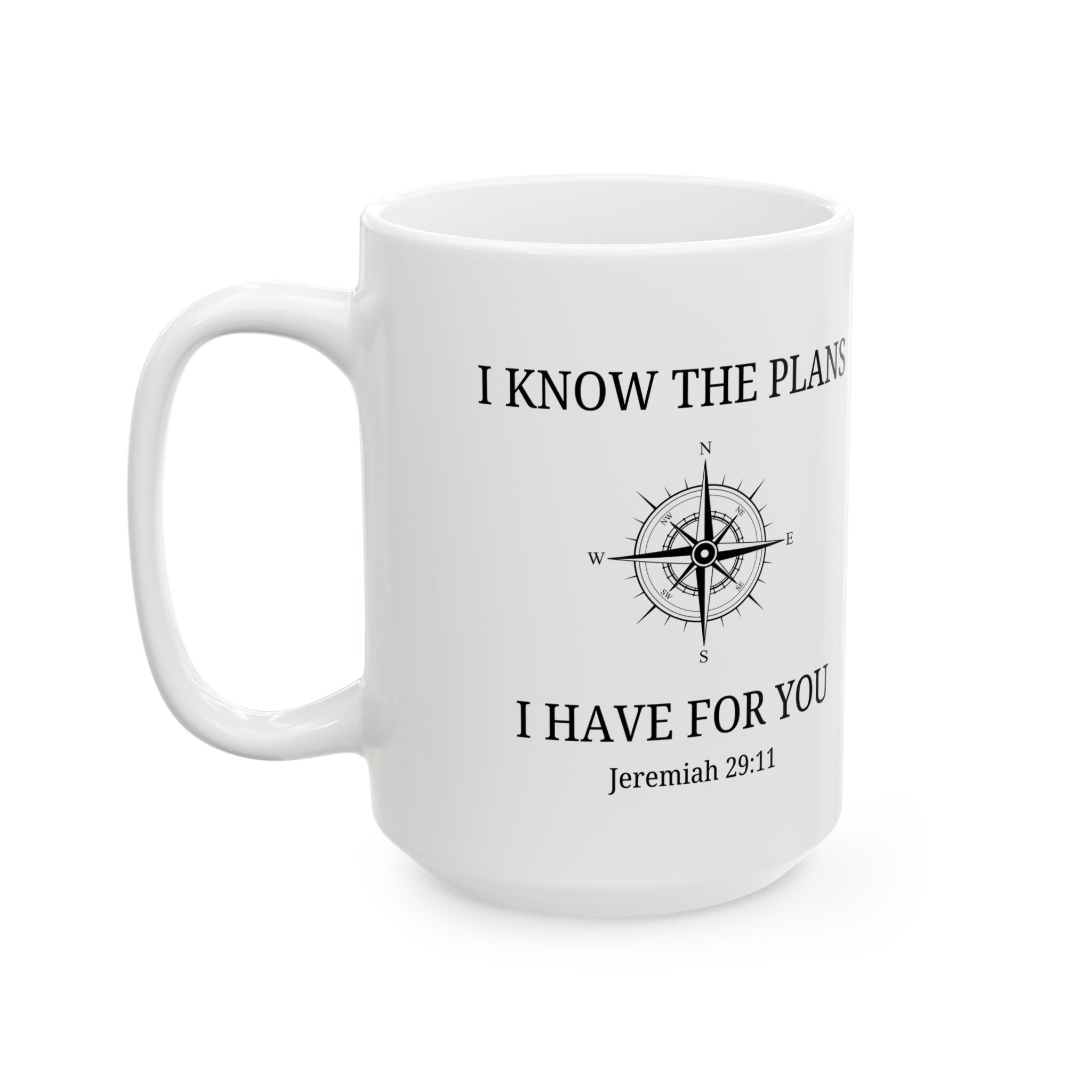 White mug with compass design and text on a white background