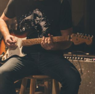 Guitarist Graphic Tee — Vintage Rock Music Electric Guitar Player T-Shirt